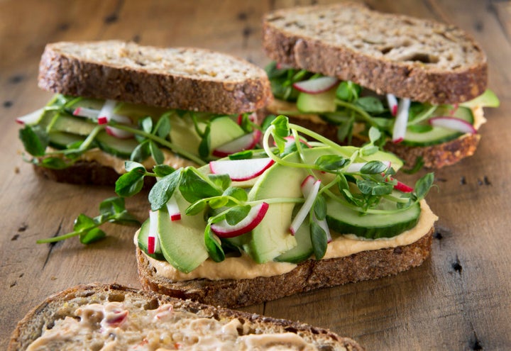 Use hummus as your sandwich spread and squeeze in as many salad veggies as possible.