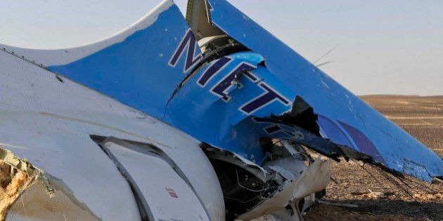 This image released by the Prime Minister's office shows the tail of a Metrojet plane that crashed in Hassana Egypt, Friday, Oct. 31, 2015. The Russian aircraft carrying 224 people, including 17 children, crashed Saturday in a remote mountainous region in the Sinai Peninsula about 20 minutes after taking off from a Red Sea resort popular with Russian tourists, the Egyptian government said. There were no survivors.(Suliman el-Oteify, Egypt Prime Minister's Office via AP)