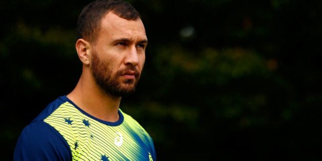 LONDON, ENGLAND - OCTOBER 20: Quade Cooper of Australia makes his way to the pitch during a training session at The Lensbury Hotel on October 20, 2015 in London, United Kingdom. (Photo by Dan Mullan/Getty Images)