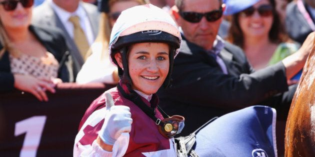 MELBOURNE, AUSTRALIA - NOVEMBER 07: Melbourne Cup winning jockey Michelle Payne celebrates after riding Palentino to win race 4 the Hilton Hotels & Resorts Stakes on Stakes Day at Flemington Racecourse on November 7, 2015 in Melbourne, Australia. (Photo by Michael Dodge/Getty Images)