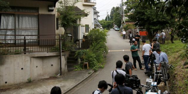 Media members gather in front of the home of a man who went on a deadly attack at a facility for the disabled, near the facility in Sagamihara, Kanagawa prefecture, Japan.