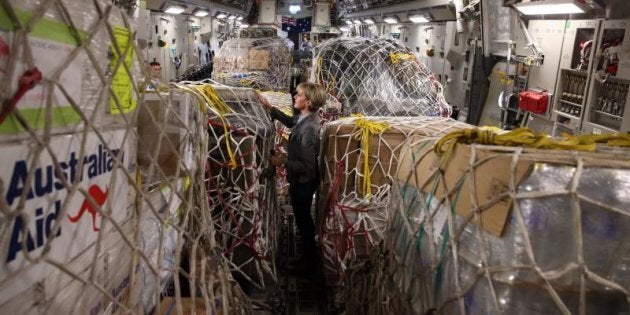 Foreign Affairs Minister Julie Bishop inspects Australian aid supplies.