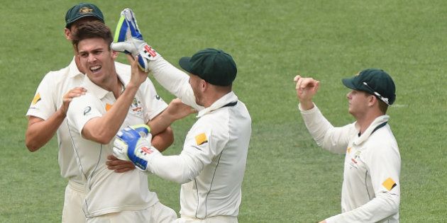 BRISBANE, AUSTRALIA - NOVEMBER 09: Mitch Marsh of Australia celebrates the wicket of Brendon McCullum of New Zealand during day five of the First Test match between Australia and New Zealand at The Gabba on November 9, 2015 in Brisbane, Australia. (Photo by Matt Roberts - CA/Cricket Australia/Getty Images)