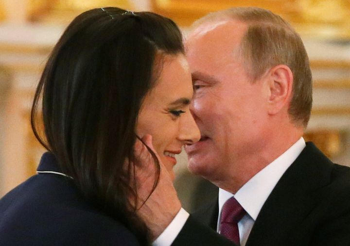 Despite her exclusion from Rio, Isinbayeva is Putin on a smile.