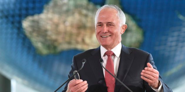 Australian Prime Minister Malcolm Turnbull delivers a speech at the National Museum of Emerging Science and Innovation Friday, Dec. 18, 2015 in Tokyo. Turnbull is on a one-day visit to Tokyo to have talks with Japanese Prime Minister Shintaro Abe. (Atsushi Tomura/Pool Photo via AP)