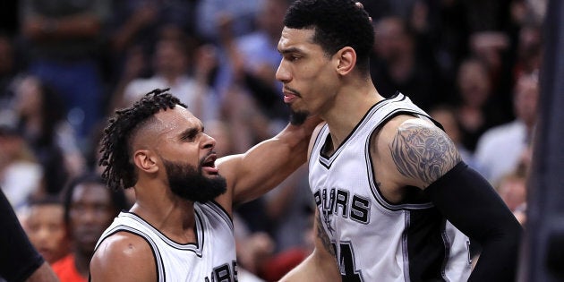 Mills (left) won a basketball game AND a facial hair contest.