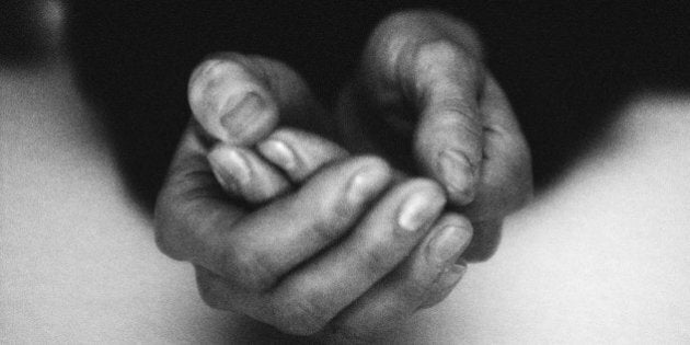 Hands together, close-up, b&w