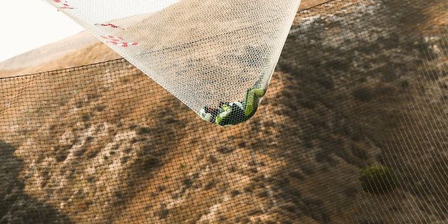 SIMI VALLEY, CA - JULY 30: Skydiver Luke Aikins lands safely after jumping 25,000 feet from an airplane without a parachute or wing suit as part of 'Stride Gum Presets Heaven Sent' on July 30, 2016 in Simi Valley, California. (Photo by Mark Davis/Getty Images for Stride Gum)