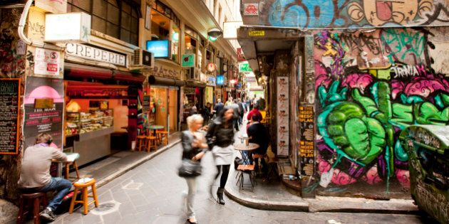 Busy city laneways, with cafes and graffitti, Melbourne, Victoria, Australia