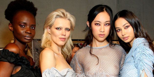 Models backstage ahead of the Alice McCall show at Mercedes-Benz Fashion Week Resort 18 Collections at Carriageworks.