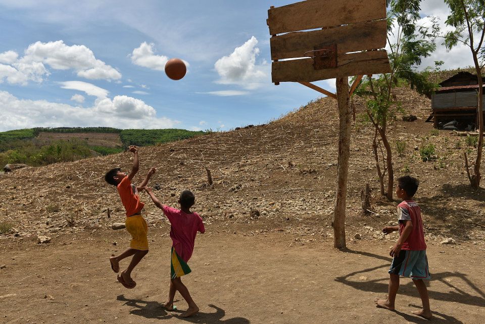 Children play basketball in Mindanao, the Philippines.