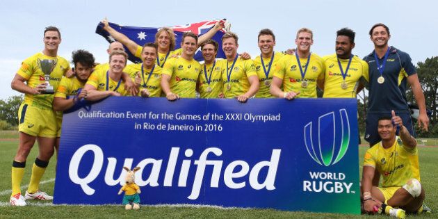 AUCKLAND, NEW ZEALAND - NOVEMBER 15: Australian players celebrate after winning the World Sevens Oceania Olympic Qualification Final between Australia and Tonga on November 15, 2015 in Auckland, New Zealand. (Photo by Simon Watts/Getty Images)