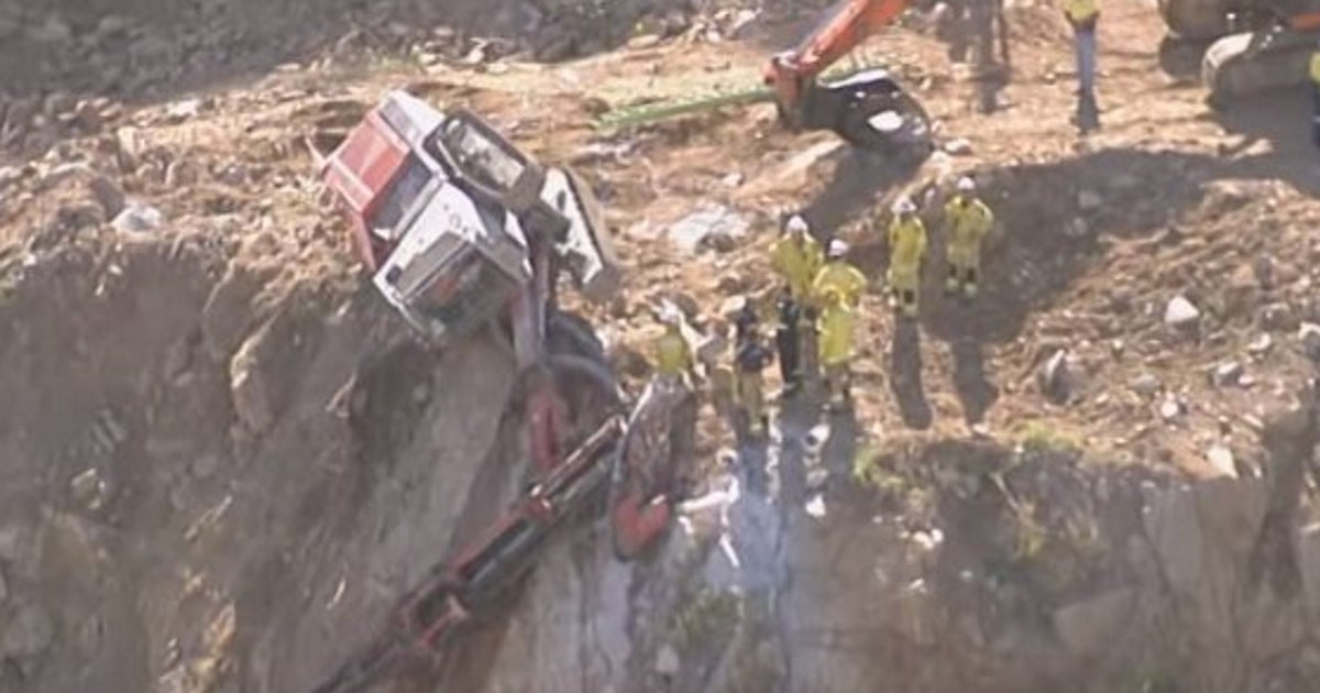 Drill Rig Hanging Over Cliff, Driver Trapped In Queensland Quarry