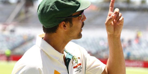 PERTH, AUSTRALIA - NOVEMBER 16: Mitchell Johnson of Australia points to the scoreboard while walking from the field during day four of the second Test match between Australia and New Zealand at WACA on November 16, 2015 in Perth, Australia. (Photo by Paul Kane/Getty Images)