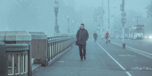 Trams, tick. Bleak weather, tick. Artful moody human on artful moody bridge, tick.