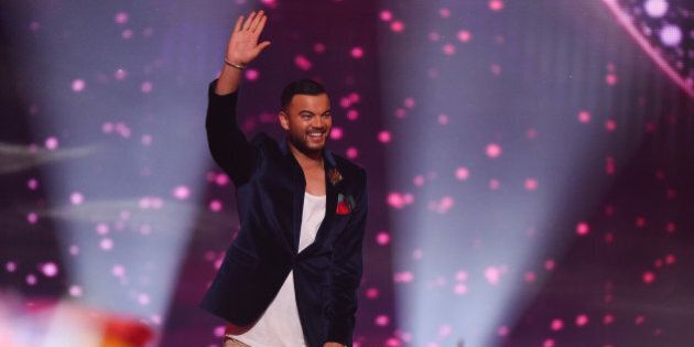 VIENNA, AUSTRIA - MAY 23: Guy Sebastian of Australia arrives on stage during the final of the Eurovision Song Contest 2015 on May 23, 2015 in Vienna, Austria. The final of the Eurovision Song Contest 2015 will take place on May 23, 2015. (Photo by Nigel Treblin/Getty Images)