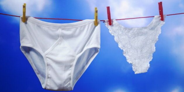 Pair of underpants and pair of knickers on washing line