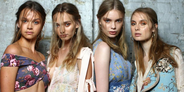 Models pose backstage ahead of the We Are Kindred show at Mercedes-Benz Fashion Week Resort 18 Collections at Carriageworks.