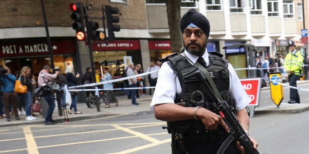 LONDON, ENGLAND - AUGUST 04: Police officers inspect the scene of a knife attack in Russell Square on August 4, 2016 in London, England. Six people were attacked by a 19 year old man with a knife at 10.30pm in Russell Square, London last night. A woman died of her injuries. The suspect was arrested at the scene and is being held at a London Hospital. Police say mental health issues are a significant factor but aren't ruling out terrorism. (Photo by Jack Taylor/Getty Images)