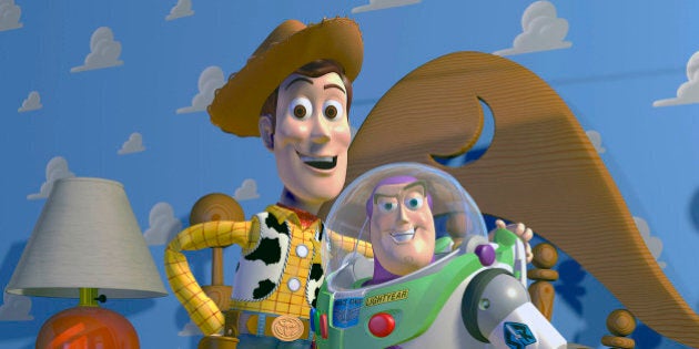 This film publicity image released by Disney Pixar shows characters Woody, left, and Buzz Lightyear, from the animated film