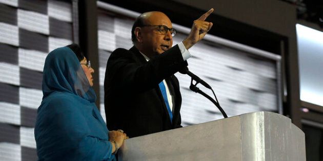 PHILADELPHIA, PA - JULY 28: Khizr Khan delivers a speech with his wife Ghazala Khan standing next to him at the Democratic National Convention in Philadelphia on July 28, 2016. An image of their fallen son, U.S. Army Capt. Humayun Khan, who was killed in Iraq in 2004 is shown on a video screen behind them. Donald Trump said that Ms. Khan had 'nothing to say.' (Photo by Michael Robinson Chavez/The Washington Post via Getty Images)