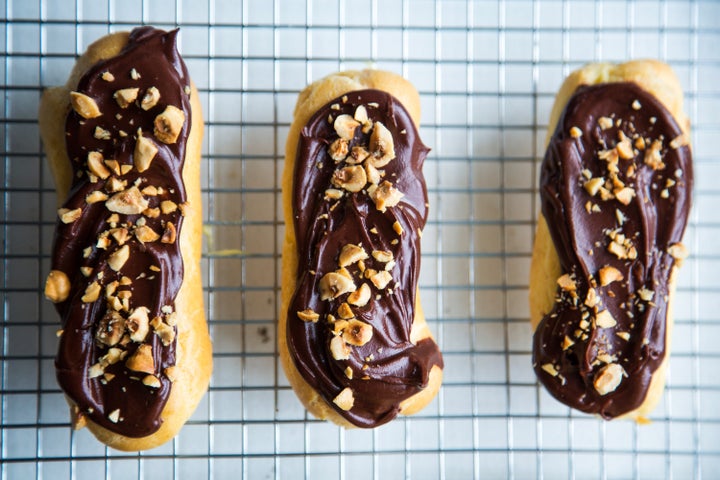 Chocolate eclairs, an all-time classic with a twist: roasted hazelnuts add a lovely texture and nutty taste.