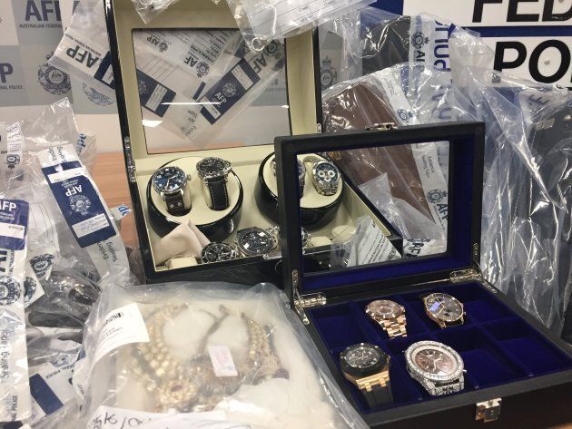 Luxury watches, worth tens of thousands each, were among the goods seized by the Australian Federal Police.