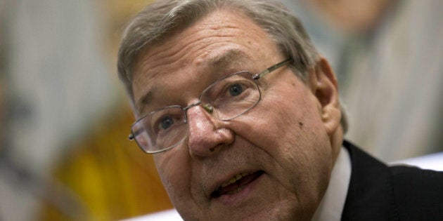 Cardinal George Pell attends a press conference at the Vatican Radio headquarters, in Rome, Tuesday, March 31, 2015. The Vatican finance minister has said he hopes to avoid financial scandal with the upcoming Jubilee year, saying the plans will be subject to new Vatican procedures to ensure they follow international standards for transparency and accountability. Cardinal George Pell outlined the Vatican's financial reform during a conference Tuesday to launch a book on better managing church assets, a priority for Pope Francis after years of financial scandal and mismanagement at the Holy See. (AP Photo/Andrew Medichini)