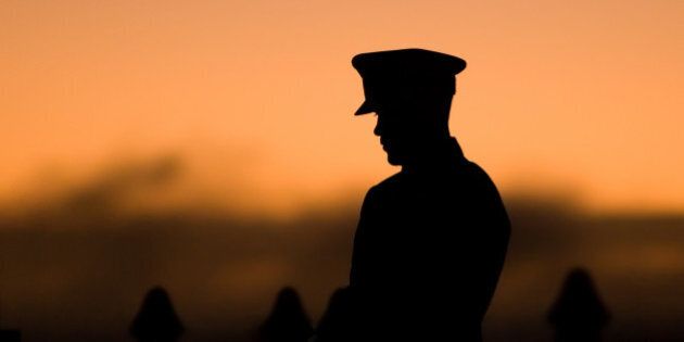 Silhouette of soldier during the Still at the State War Memorial