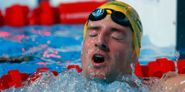 Australia's James Magnussen reacts after winning the men's 100m freestyle final during the World Swimming Championships at the Sant Jordi arena in Barcelona August 1, 2013. REUTERS/Michael Dalder (SPAIN - Tags: SPORT SWIMMING)