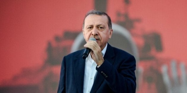 Turkish President Recep Tayyip Erdogan speaks on August 7, 2016 in Istanbul during a rally against the failed military coup on July 15.