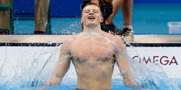Britain's Adam Peaty broke the world record of the men's 100m breaststroke on day two of the Rio Olympics.