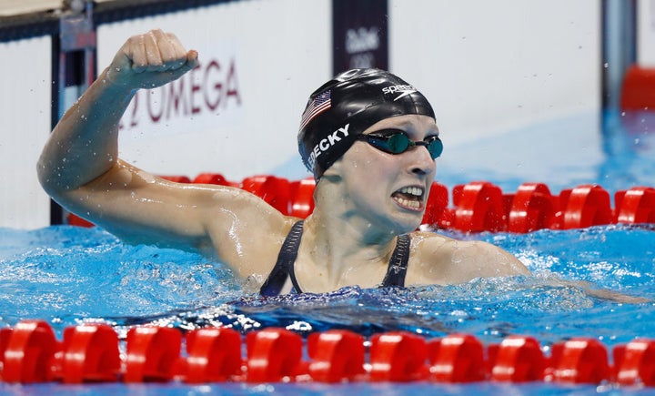 U.S. swimmer Katie Ledecky wins gold and sets a new world record in the Women's 400m Freestyle.