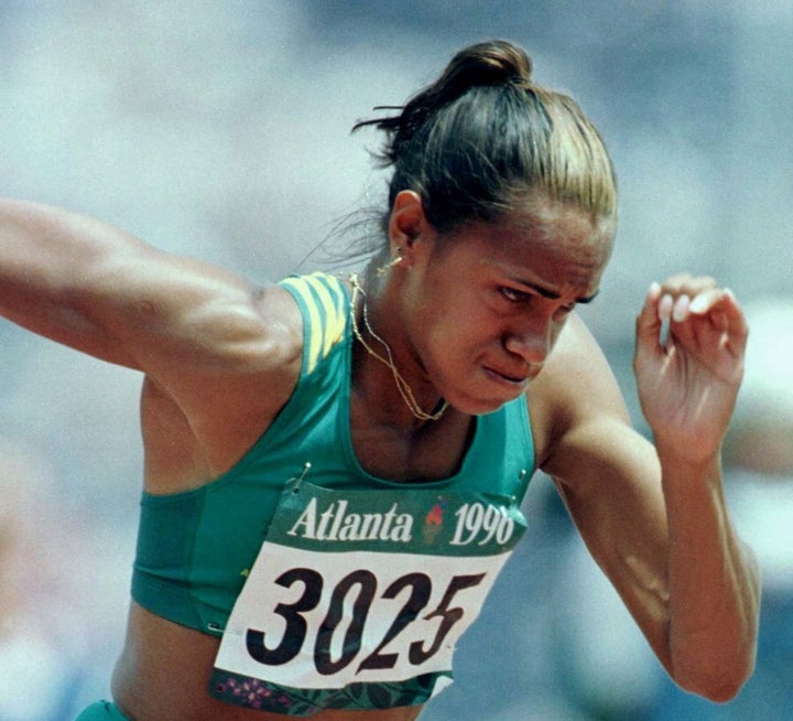 Cathy Freeman feels the burn in the Women's 400 metres qualifying round at the Atlanta Olympics.