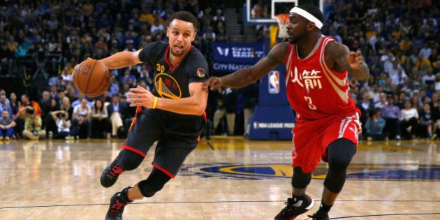 OAKLAND, CA - FEBRUARY 09: Stephen Curry #30 of the Golden State Warriors drives on Ty Lawson #3 of the Houston Rockets at ORACLE Arena on February 9, 2016 in Oakland, California. NOTE TO USER: User expressly acknowledges and agrees that, by downloading and or using this photograph, User is consenting to the terms and conditions of the Getty Images License Agreement. (Photo by Ezra Shaw/Getty Images)