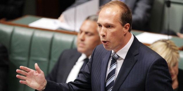CANBERRA, AUSTRALIA - JULY 15: MInister for Health Peter Dutton during Question Time at Parliament House on July 15, 2014 in Canberra, Australia. A vote on the Government's Carbon Tax Repeal Legislation has been delayed as debate in the Senate continues. (Photo by Stefan Postles/Getty Images)
