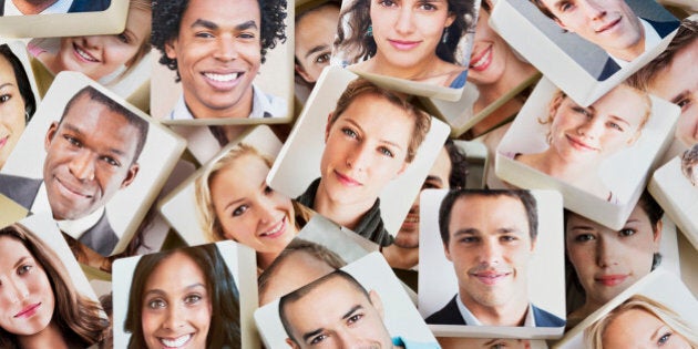 A pile of discs with smiling faces on them