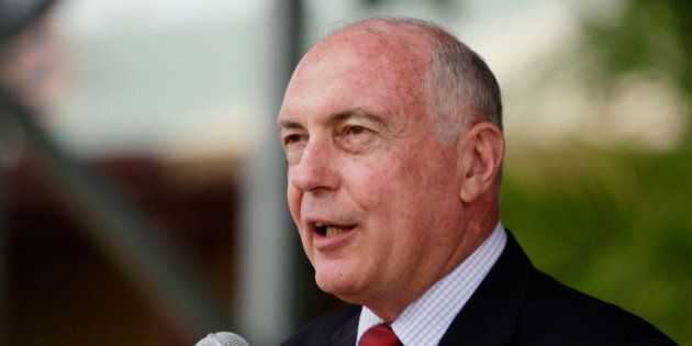 WINTON, AUSTRALIA - APRIL 19: Australian Deputy Prime Minister, Warren Truss, speaks at the launch of the Matilda Centre ANZAC display on April 19, 2015 in Winton, Australia. The 2015 ANZAC Troop Train Re-Enactment commemorates the 100 year celebration of ANZAC, the steam train with nine authentic refurbished carriages will travel from Winton to Brisbane stopping overnight at Longreach, Emerald, Rockhampton and Maryborough. 225 passengers many of whom are family members of service men and women will stop along the way and pay their respects to those who served during re-enactment ceremonies. (Photo by Lisa Maree Williams/Getty Images)