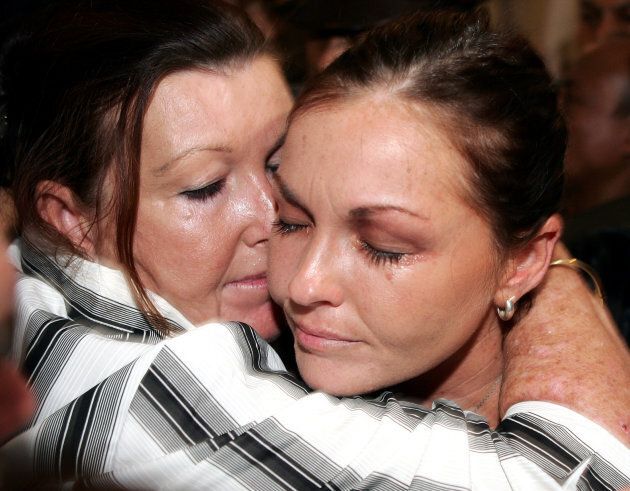 Schapelle Corby is hugged by her mother, Rosalie Rose, after she was found guilty of drug trafficking.