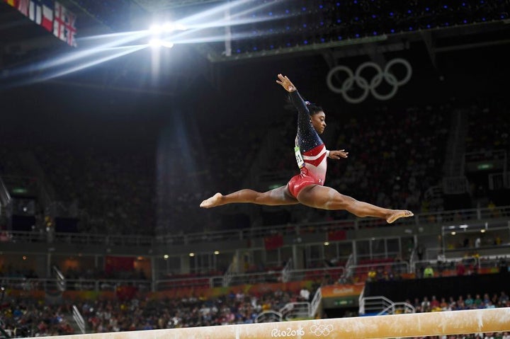 Miles dos things on the balance beam you normally only see on floor routines.