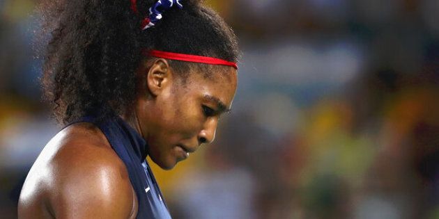 RIO DE JANEIRO, BRAZIL - AUGUST 09: Serena Williams of the United States reacts during a Women's Singles Third Round match against Elina Svitolina of Ukraine on Day 4 of the Rio 2016 Olympic Games at the Olympic Tennis Centre on August 9, 2016 in Rio de Janeiro, Brazil. (Photo by Cameron Spencer/Getty Images)