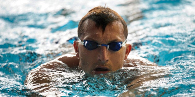 FILE - In this Nov. 3, 2011, file photo, former Olympic swimming champion Ian Thorpe, of Australia, trains in Singapore. Thorpe has come to grips with his failure to qualify for the Olympics in his comeback from retirement but is still at the games working for British TV and representing his sponsor. (AP Photo/Bryan van der Beek, File)