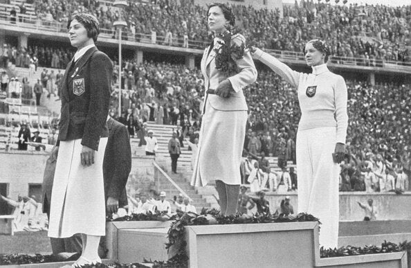 Helene Mayer giving the Nazi salute on the Olympic podium.