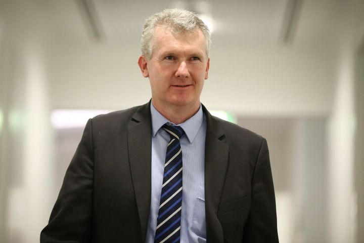 A 25-year-old, ambitious young foot soldier Tony Burke worked "in tandem" with an anti assisted suicide network in the mid-1990's, Andrew Denton said.