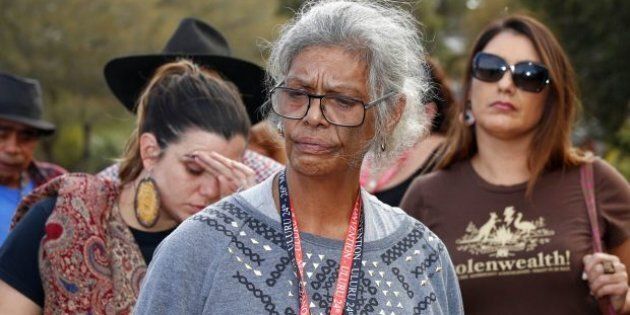 Jenny Munro and delegates address the media after walking out of the First Nations National Convention at Uluru. Photo: Alex Ellinghausen