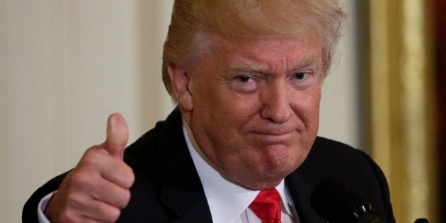 U.S. President Donald Trump gestures while attending a “celebration of military mothers