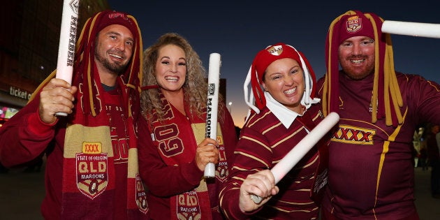 Crazy maroons fans arrive for the annual slaughter of Blue people at Suncorp Stadium in Brisbane.