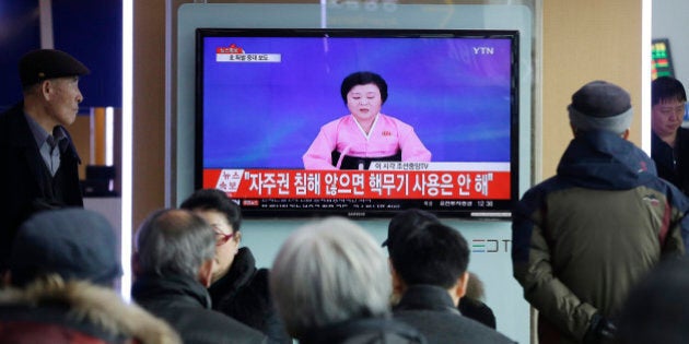 People watch a TV news program showing North Korea's announcement, at the Seoul Railway Station in Seoul, South Korea, Wednesday, Jan. 6, 2016. North Korea said Wednesday it had conducted a hydrogen bomb test, a defiant and surprising move that, if confirmed, would put Pyongyang a big step closer toward improving its still-limited nuclear arsenal. The letters read