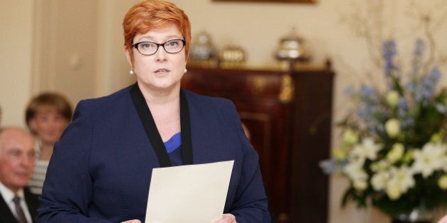 CANBERRA, AUSTRALIA - SEPTEMBER 21: Minister for Defence Marise Payne is sworn in by Governor-General Sir Peter Cosgrove during the swearing-in ceremony of the new Turnbull Government at Government House on September 21, 2015 in Canberra, Australia. Prime Minister Malcolm Turnbull announced a new look front bench on Sunday. (Photo by Stefan Postles - Pool/Getty Images)
