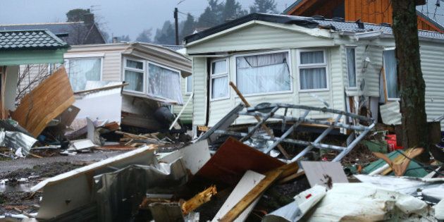 BALLATER, SCOTLAND - JANUARY 5 : Personal belongings and wrecked caravans at Ballater Caravan Park after the River Dee burst its banks and inundated the city with flood water on January 5, 2016 in Ballater, United Kingdom. Stormy weather continues to bring heavy rain fall and flooding to the north of England and Scotland, causing widespread disruption to transport and infrastructure. (Photo by Mark Runnacles/Getty Images)